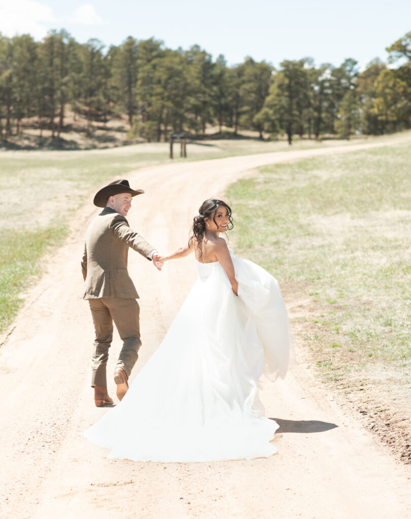 Colorado wedding phtographer with couple at younger ranch in Colorado Springs